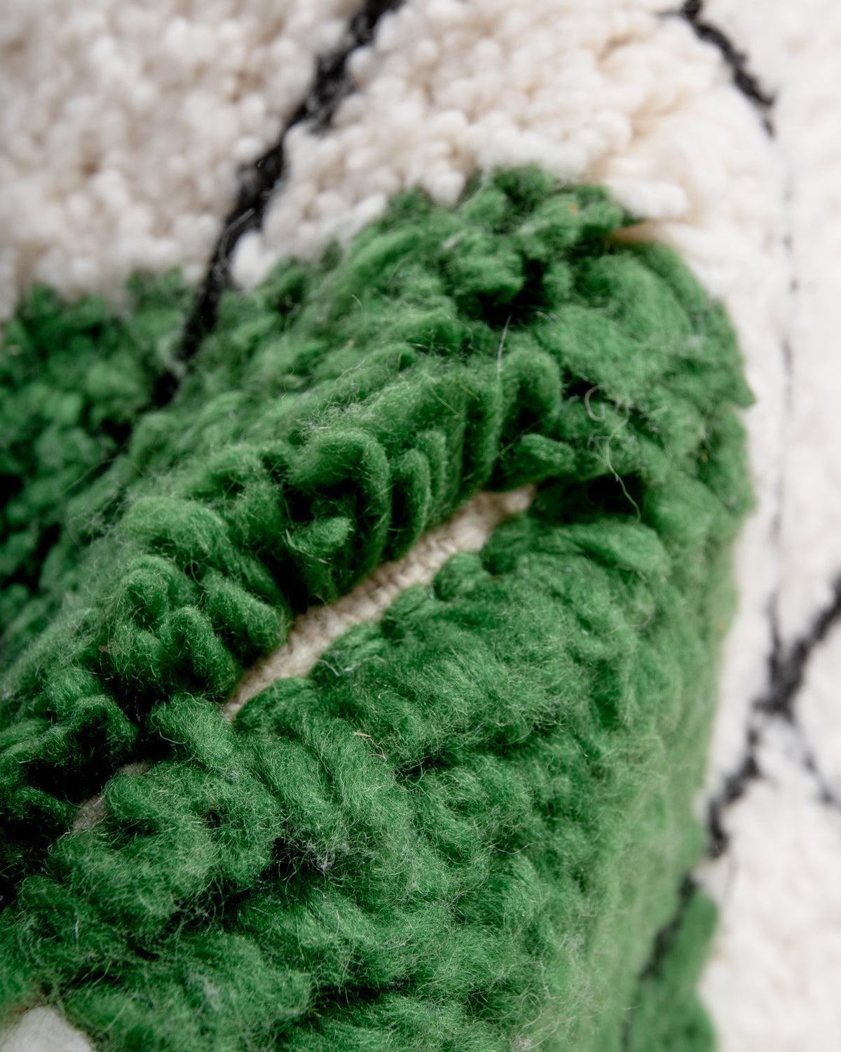 Modern, designer, handcrafted Berber rug from Morocco. Beniourain carpet with beautiful colours and patterns and fluffy wool texture.